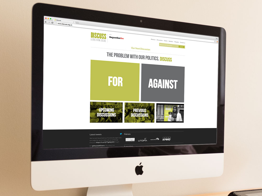 A mockup of the Discuss website on an iMac